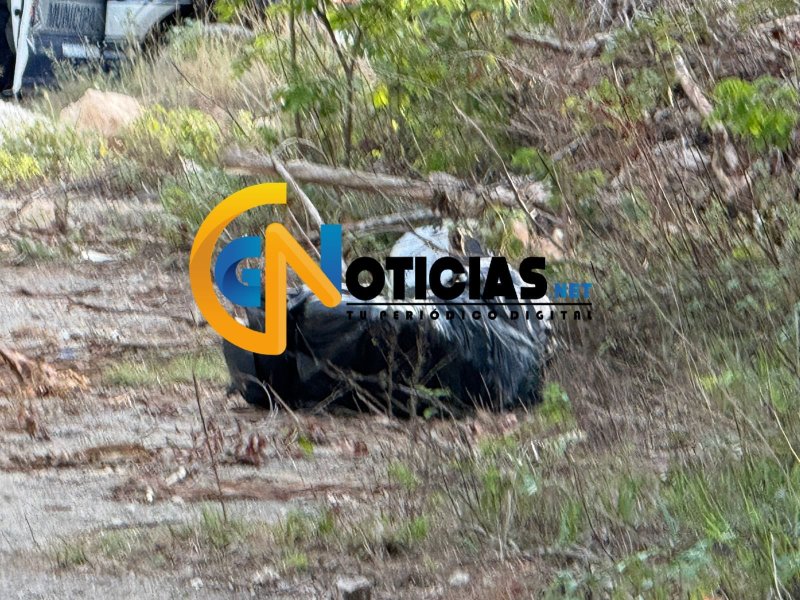 Un cuerpo embolsado fue hallado en un área verde que colinda con un camino de terracería de la colonia Cuna Maya